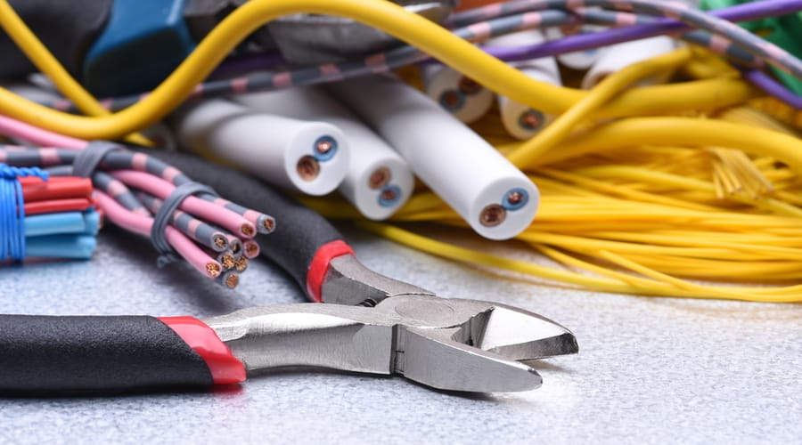 Materials used for electrical installation, including pliers and wires