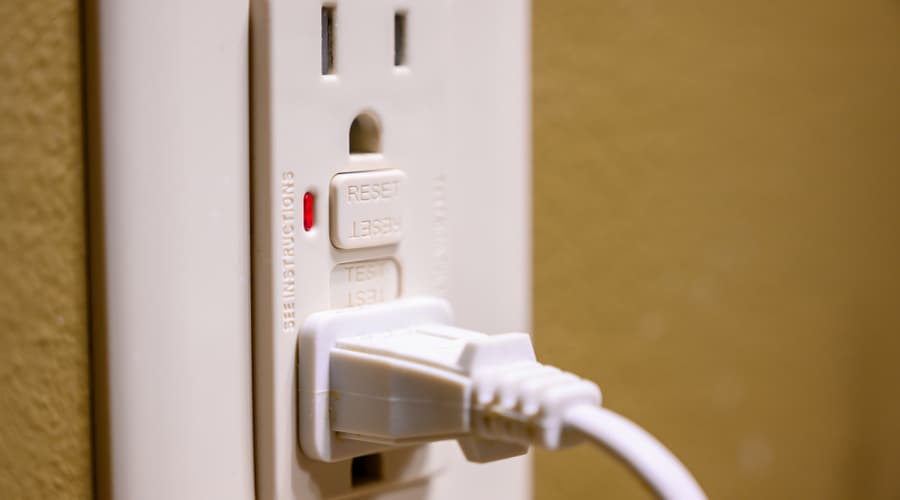 Close up of a GFCI outlet