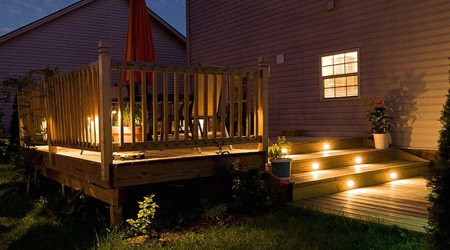 Deck stair lights on a wooden deck