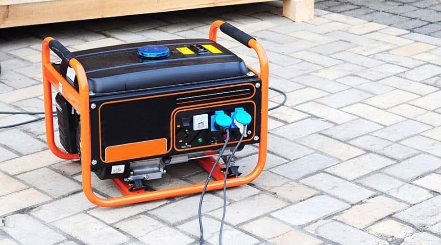 An orange and black gasoline portable generator