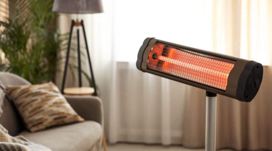 a space heater next to a couch